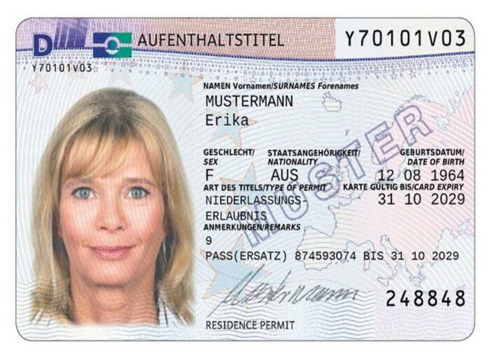 Traveler organizing passport, ID cards, and safety checklist before international flight